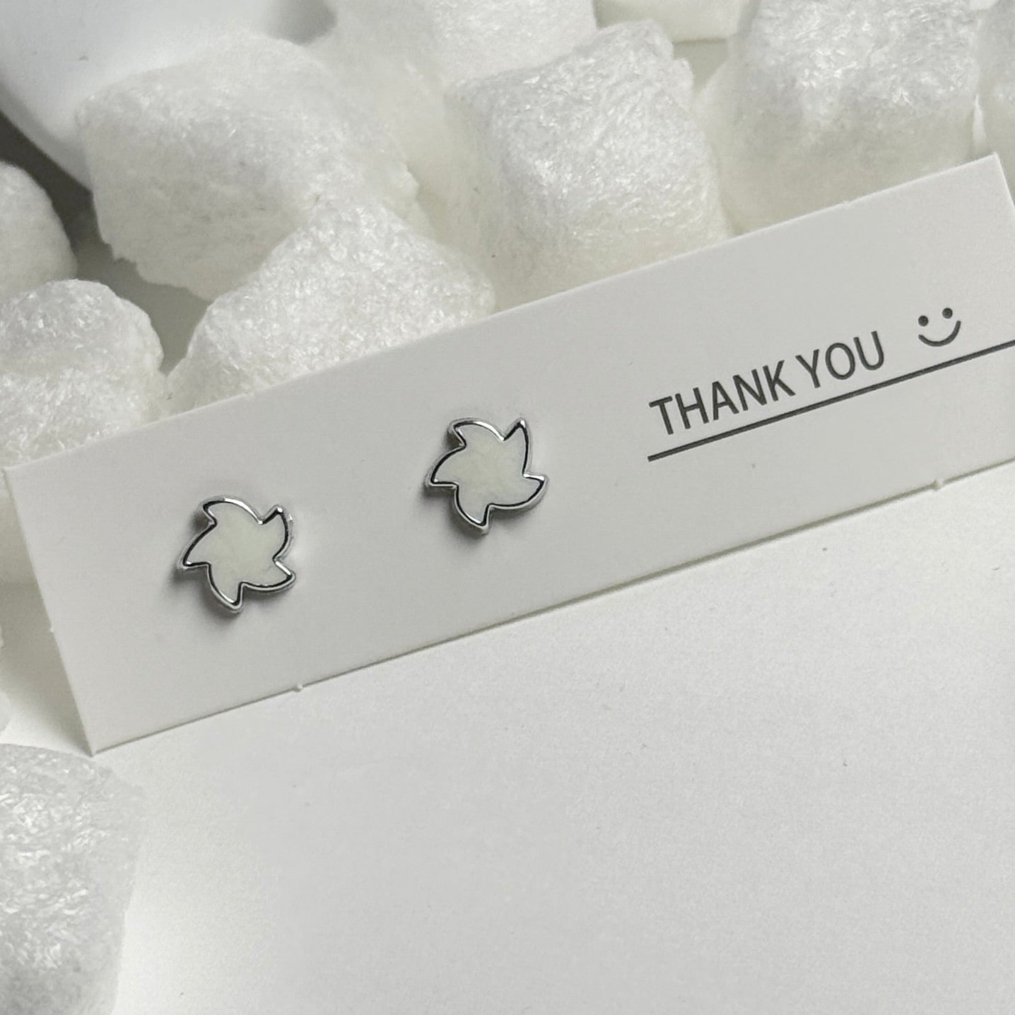 White Enamel Maple Leaf Silver Frame Stud Earrings C