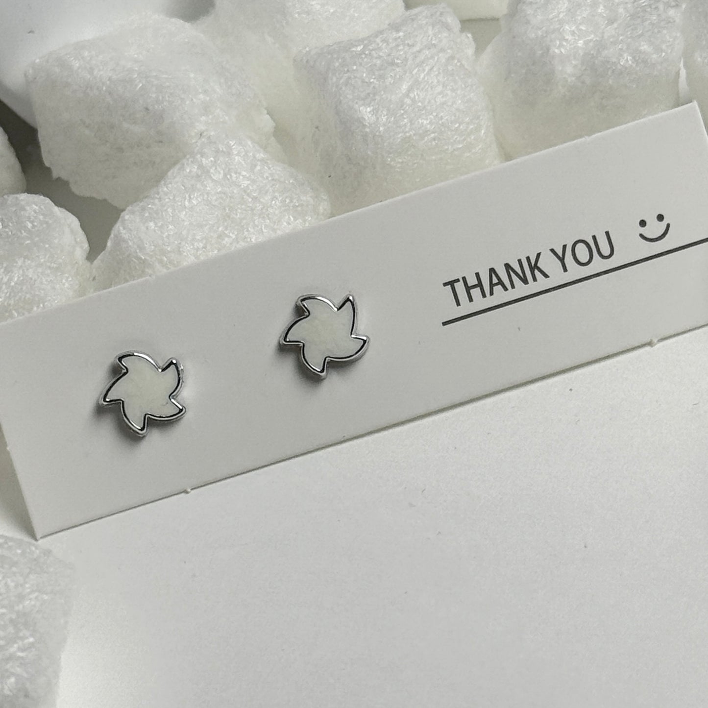 White Enamel Maple Leaf Silver Frame Stud Earrings C