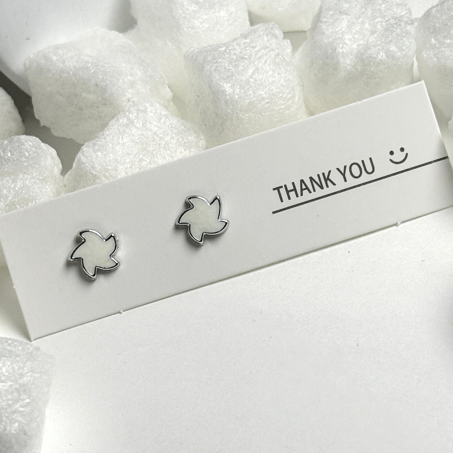 White Enamel Maple Leaf Silver Frame Stud Earrings C