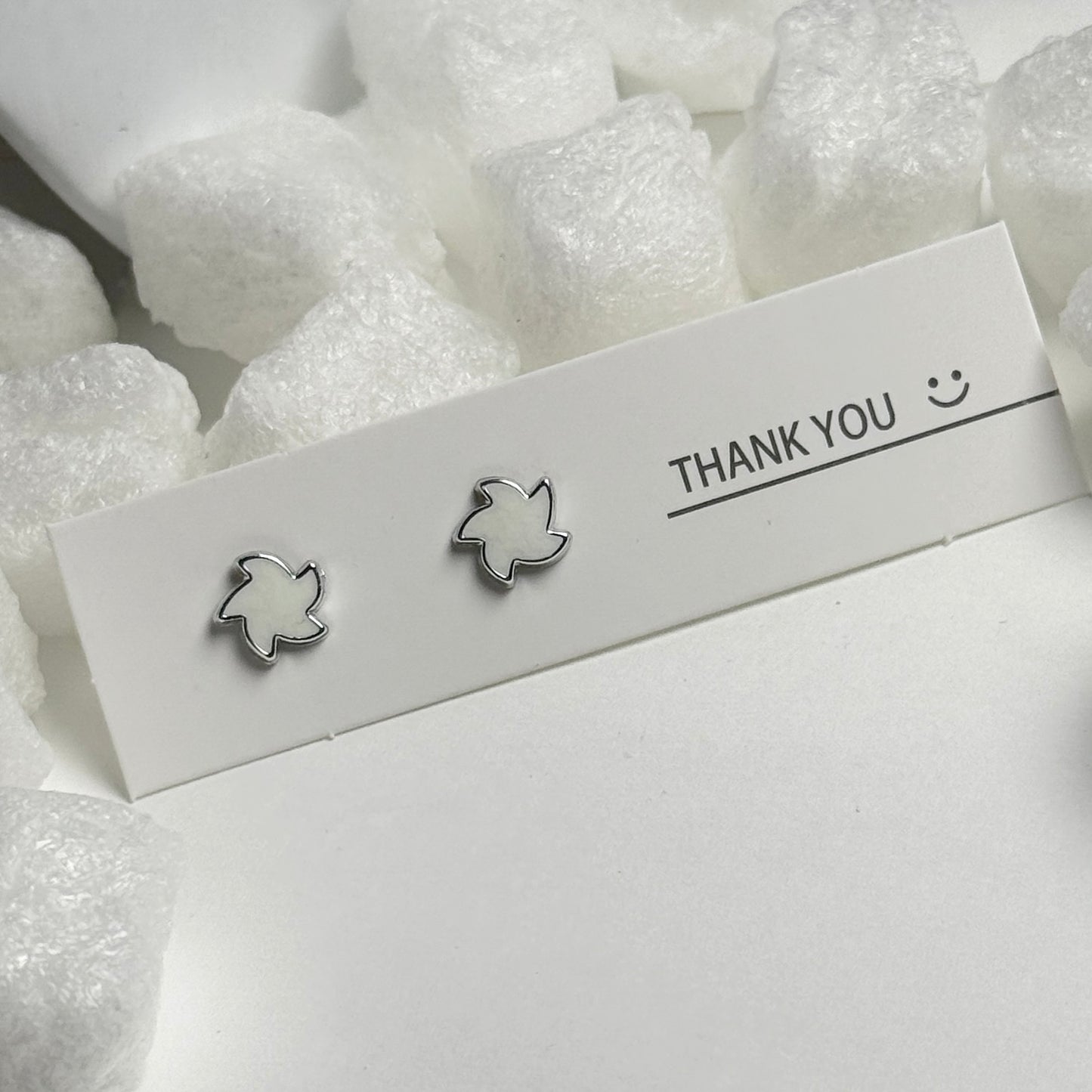 White Enamel Maple Leaf Silver Frame Stud Earrings C