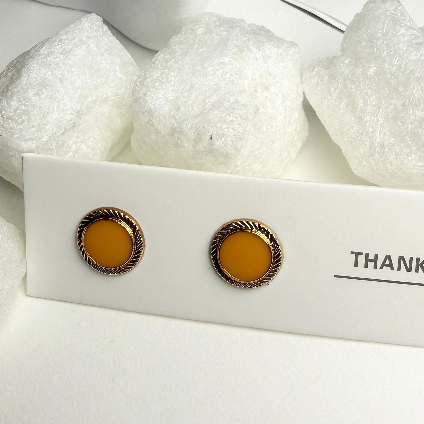 Yellow and golden enamel studs G2