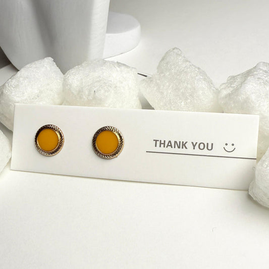 Yellow and golden enamel studs G2