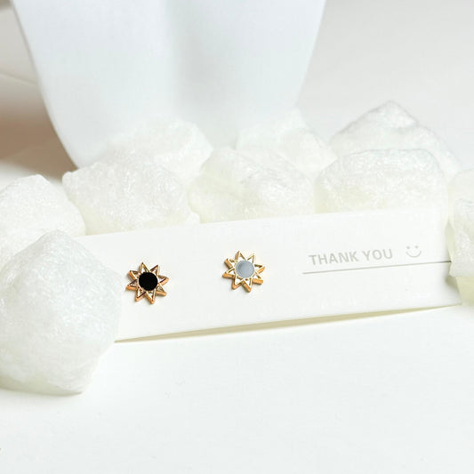 Star-Shaped Stud Earrings with Gold Trim and Black and White Enamel Centers G