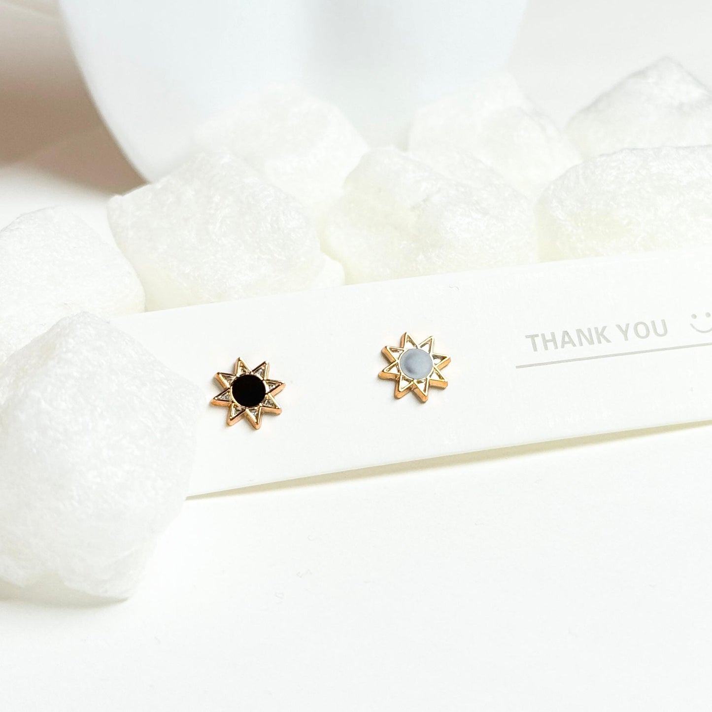 Star-Shaped Stud Earrings with Gold Trim and Black and White Enamel Centers G
